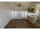 Bright living room with ceiling fan, and wood flooring at 3520 N Yucca Dr, Florence, AZ 85132