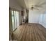 Comfortable living room with ample light, smooth carpet and a ceiling fan at 3520 N Yucca Dr, Florence, AZ 85132