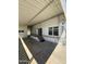 Wide covered patio providing a relaxing outdoor space with steps leading up to the entrance at 3520 N Yucca Dr, Florence, AZ 85132