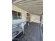 Covered patio featuring brick pavers, offering a comfortable outdoor space at 3520 N Yucca Dr, Florence, AZ 85132