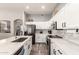 Bright kitchen features granite countertops, mosaic tile backsplash, and stainless steel appliances at 3668 E Cody Ave, Gilbert, AZ 85234