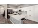 Bright kitchen with stainless appliances, granite countertops, and modern backsplash at 3668 E Cody Ave, Gilbert, AZ 85234