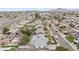 Neighborhood aerial view showcases community living with mature trees, pools and convenient location near a highway at 3802 W Rue De Lamour Ave, Phoenix, AZ 85029