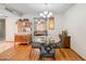 Dining room featuring a glass table and decorative chairs at 3802 W Rue De Lamour Ave, Phoenix, AZ 85029
