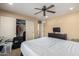 Bedroom featuring a ceiling fan and closet at 38397 N Nuevo Laredo Ln, San Tan Valley, AZ 85140