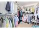 Walk-in closet with built-in shelving and ample space for storage at 38397 N Nuevo Laredo Ln, San Tan Valley, AZ 85140