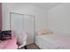 The bedroom boasts carpet, closet, ceiling fan, and includes a vanity desk at 384 N Scott Dr, Chandler, AZ 85225