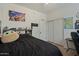 The bedroom has carpet, closet, and a dedicated desk area at 384 N Scott Dr, Chandler, AZ 85225