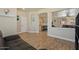 Open living space featuring wood floors, neutral paint, and natural light at 384 N Scott Dr, Chandler, AZ 85225