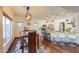 Open kitchen and dining area with modern finishes at 45176 W Alamendras St, Maricopa, AZ 85139