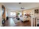 Spacious living room with ample seating and lots of natural light at 45176 W Alamendras St, Maricopa, AZ 85139