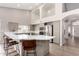Modern kitchen with an island, vaulted ceiling, and stainless steel appliances at 5140 S Tanglewood Dr, Chandler, AZ 85248