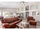Open-concept living area featuring hardwood floors and high ceilings with clerestory windows at 5140 S Tanglewood Dr, Chandler, AZ 85248