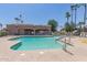 Community pool area with lounge chairs and a covered area for relaxing by the pool at 5140 S Tanglewood Dr, Chandler, AZ 85248