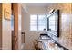 Retro-designed bathroom features a stylish sink and classic fixtures at 536 W Windsor Ave, Phoenix, AZ 85003