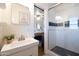 Bathroom featuring a sink and glass enclosed shower at 536 W Windsor Ave, Phoenix, AZ 85003