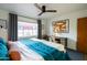 Bedroom with stylish furnishings, natural light, and a ceiling fan at 536 W Windsor Ave, Phoenix, AZ 85003