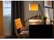 Bedroom's desk and chair features stylish furnishings, natural light, and a ceiling fan at 536 W Windsor Ave, Phoenix, AZ 85003