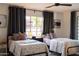 Bedroom featuring two beds with a ceiling fan at 536 W Windsor Ave, Phoenix, AZ 85003