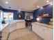 Bright eat-in kitchen with stainless appliances, granite counters, and open to the living room at 536 W Windsor Ave, Phoenix, AZ 85003
