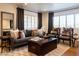 Cozy living room with plantation shutters, stylish furniture, and modern decor, perfect for relaxing or entertaining at 536 W Windsor Ave, Phoenix, AZ 85003