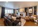 Inviting living room featuring a cozy fireplace, built-in shelving, and comfortable seating at 536 W Windsor Ave, Phoenix, AZ 85003