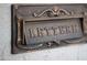 Close-up of an ornate vintage-style mailbox with the word 'LETTERE' embossed at 536 W Windsor Ave, Phoenix, AZ 85003