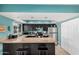 Updated kitchen with a breakfast bar, stainless steel appliances, and ample counter space at 8554 E Mcdonald Dr, Scottsdale, AZ 85250