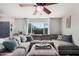 Inviting living room featuring a plush sectional sofa and abundant natural light at 8554 E Mcdonald Dr, Scottsdale, AZ 85250