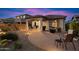Backyard patio area, perfect for outdoor dining and entertaining, with a grill for barbecues at 8661 E Ivy St, Mesa, AZ 85207