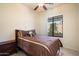 Bedroom with neutral colors and ample natural light at 8661 E Ivy St, Mesa, AZ 85207