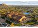 Stunning aerial view of the community center with pool, showcasing the amenities and beautiful surroundings at 8661 E Ivy St, Mesa, AZ 85207