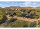Aerial view of the community park with playground, picnic areas, and green spaces for residents to enjoy at 8661 E Ivy St, Mesa, AZ 85207