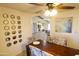 Dining room showcasing a wooden table and chairs with stylish decor at 9732 N Penworth Dr, Casa Grande, AZ 85122