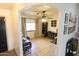 Home office with a large desk, wood-look flooring, and neutral walls at 9732 N Penworth Dr, Casa Grande, AZ 85122