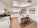 Well-lit kitchen features a functional island, granite countertops, and stainless steel appliances at 2416 W Stottler Dr, Chandler, AZ 85224