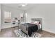 Bright bedroom with playful decor, a metal bed frame, and two sunny windows at 3856 E Sagebrush St, Gilbert, AZ 85296