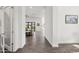 Inviting entryway featuring wood-look tile flooring and an open floor plan leading to the living area at 3856 E Sagebrush St, Gilbert, AZ 85296