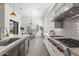 Well-equipped kitchen features stainless steel appliances, stylish countertops, and a dining area at 3856 E Sagebrush St, Gilbert, AZ 85296
