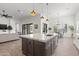 Open-concept kitchen flows into the living area, boasting a large island and modern finishes at 3856 E Sagebrush St, Gilbert, AZ 85296