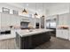 Modern kitchen featuring a large island, stainless steel appliances, and sleek countertops at 3856 E Sagebrush St, Gilbert, AZ 85296