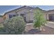 Charming single-story home with desert landscaping and a well-maintained front yard in a residential neighborhood at 803 W Burkhalter Dr, San Tan Valley, AZ 85143