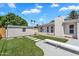 Back yard with artificial turf, pavers and accessory structure at 8215 E Virginia Ave, Scottsdale, AZ 85257