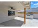 Backyard covered patio with concrete floor and stainless steel grill on attached counter at 8215 E Virginia Ave, Scottsdale, AZ 85257