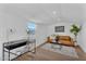 Bonus room with hard surface floors, desk and seating area at 8215 E Virginia Ave, Scottsdale, AZ 85257