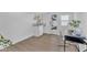 Bright home office area with modern desk, natural light, stylish cabinets and wood flooring at 8215 E Virginia Ave, Scottsdale, AZ 85257