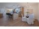 Open concept kitchen and dining area with marble island and modern decor at 8215 E Virginia Ave, Scottsdale, AZ 85257