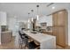 Beautiful kitchen with eat in seating, stainless steel appliances, and views to the living room at 8215 E Virginia Ave, Scottsdale, AZ 85257