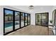 Living room with sliding doors opening to the swimming pool and backyard at 8215 E Virginia Ave, Scottsdale, AZ 85257