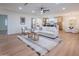 Bright living room with hardwood floors, a ceiling fan, and modern furnishings at 8215 E Virginia Ave, Scottsdale, AZ 85257